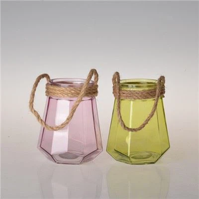 Stakleni stalak za svijeće s ručkom